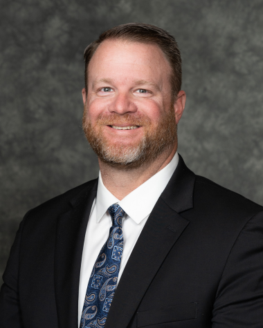 Headshot of Jason Snuggs.